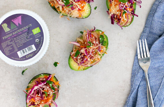 Avocado Boats, With Beetroot, Sauerkraut and Pomegranate Salad and a Tahini Dressing image