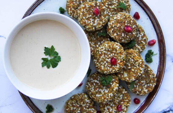 Raw falafel with tahini dipping sauce image